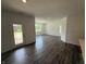 Spacious living room featuring modern flooring, recessed lighting, and a bright, airy feel at 2143 Warbler St, Danville, IN 46122