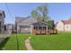 Well-maintained backyard with a wood deck is perfect for outdoor relaxation and entertaining at 2319 S I St, Elwood, IN 46036