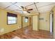 Inviting bedroom with wood-look floors, closet and natural light creating a cozy retreat within the home at 2319 S I St, Elwood, IN 46036