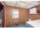 Bedroom with a comfortable bed and a window providing natural light, creating a peaceful and relaxing atmosphere at 2319 S I St, Elwood, IN 46036