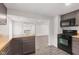 Kitchen with butcher block countertop, dark gray cabinetry, and modern black oven range at 2321 W 26Th St, Anderson, IN 46016