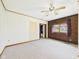 Spacious bedroom featuring a brick accent wall, and neutral carpeting at 238 Jefferson St, Pendleton, IN 46064