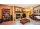 Finished basement featuring a fireplace, display shelves, and comfortable furniture at 2508 Indian Creek Rd, Trafalgar, IN 46181