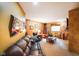 Finished basement with comfortable seating, a window, and unique wall decorations at 2508 Indian Creek Rd, Trafalgar, IN 46181