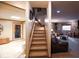 Basement rec room with carpet flooring, staircase, and casual seating area at 2508 Indian Creek Rd, Trafalgar, IN 46181