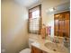 Bathroom with single sink vanity, with natural light from a window at 2508 Indian Creek Rd, Trafalgar, IN 46181