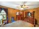 Comfortable bedroom featuring wood furniture and warm, inviting decor at 2508 Indian Creek Rd, Trafalgar, IN 46181