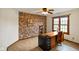 The bedroom has natural light and a dark accent wall with a wooden baseboard at 2508 W Indian Creek Rd, Trafalgar, IN 46181