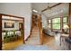 Open foyer featuring staircase, vaulted ceilings, view into dining room and view into living room at 2508 Indian Creek Rd, Trafalgar, IN 46181