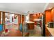 Spacious kitchen features a center island, stainless appliances and charming breakfast nook at 2508 Indian Creek Rd, Trafalgar, IN 46181