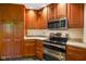 Modern kitchen with stainless steel oven and microwave at 2508 Indian Creek Rd, Trafalgar, IN 46181