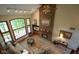 Aerial view of the living room shows fireplace, seating, and large windows at 2508 Indian Creek Rd, Trafalgar, IN 46181