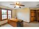 Bright home office space with a desk, a checkered game board, and natural light at 2508 Indian Creek Rd, Trafalgar, IN 46181