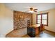Office with a classic desk, built-in shelving, and neutral decor at 2508 Indian Creek Rd, Trafalgar, IN 46181