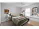 Well-lit bedroom features a cozy bed, decorative lights, and functional furniture pieces at 2542 Barstow Dr, Whitestown, IN 46075