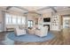 Comfortable clubhouse lounge area with stylish furniture, modern lighting, and decorative built-in shelving at 2542 Barstow Dr, Whitestown, IN 46075