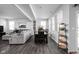 Open-concept living and dining area featuring hardwood floors and modern decor at 2542 Barstow Dr, Whitestown, IN 46075