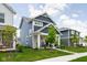 Attractive two-story home with manicured lawn and curb appeal in a residential neighborhood at 2542 Barstow Dr, Whitestown, IN 46075