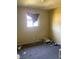 Image shows a dirty bedroom that needs to be cleaned and renovated at 2609 Mars Hill St, Indianapolis, IN 46241