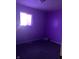 Picture of a bedroom that has damaged walls and carpeting at 2609 Mars Hill St, Indianapolis, IN 46241