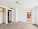 Modest bedroom features neutral carpet, white walls, and natural light coming through the doorways at 29 E Pine St, Anderson, IN 46012