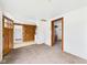 Open living room showcasing access to other rooms and an area ready for renovation at 29 E Pine St, Anderson, IN 46012
