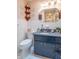 Clean bathroom with vanity, mirror, and ample lighting at 295 Maple Turn Rd, Martinsville, IN 46151