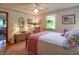 Charming bedroom with hardwood floors, a floral wallpaper border, and abundant natural light at 295 Maple Turn Rd, Martinsville, IN 46151