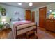 Cozy bedroom featuring a ceiling fan and hardwood floors at 295 Maple Turn Rd, Martinsville, IN 46151