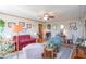 Comfortable living room with ceiling fan, warm lighting, and inviting seating at 295 Maple Turn Rd, Martinsville, IN 46151