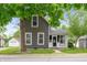 Charming two-story home with gray siding, white trim, and a well-maintained front yard at 3019 W Huntsville Rd, Pendleton, IN 46064