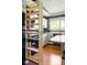 View of open shelving in pantry and white kitchen cabinets at 3022 Cameron St, Indianapolis, IN 46203