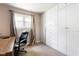 Home office with built-in storage, carpet flooring, and window offering natural light at 3022 Cameron St, Indianapolis, IN 46203