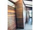 Hallway with wood paneling on the walls and doorways at 3081 Woodridge Rd, Shelbyville, IN 46176