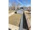 Spacious fenced backyard with a detached garage and potential for landscaping at 337 N Beville Ave, Indianapolis, IN 46201