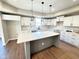 Bright kitchen featuring white cabinetry, a center island, and stylish pendant lighting at 337 N Beville Ave, Indianapolis, IN 46201
