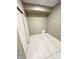 Spacious laundry room with white tile flooring and ample space at 337 N Beville Ave, Indianapolis, IN 46201