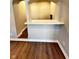 Inviting living space featuring open archways and beautiful hardwood floors at 337 N Beville Ave, Indianapolis, IN 46201