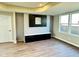 Stylish living room showcases hardwood floors and a modern accent wall at 337 N Beville Ave, Indianapolis, IN 46201