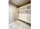 Organized mudroom with built-in shelving and hooks, perfect for storage at 337 N Beville Ave, Indianapolis, IN 46201