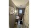 Bathroom features a decorative love sign and a shower with a leopard print curtain at 3731 N Tacoma Ave, Indianapolis, IN 46218