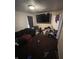 Living room featuring carpeted flooring, one window and dark color accents at 3731 N Tacoma Ave, Indianapolis, IN 46218