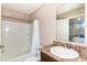 Bathroom with bathtub, shower, standard lighting, single sink with laminate countertop at 4033 Tahoe Dr, Indianapolis, IN 46235
