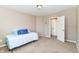 Neutral bedroom with carpet, standard lighting and closet with a door ajar at 4033 Tahoe Dr, Indianapolis, IN 46235