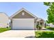 Charming single-Gathering home with a well-manicured lawn and a two-car garage at 4033 Tahoe Dr, Indianapolis, IN 46235