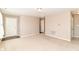 Bright, carpeted living room with neutral walls and modern lighting at 4033 Tahoe Dr, Indianapolis, IN 46235