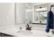 Modern bathroom vanity with quartz countertop, mirror, stylish faucet, and decor at 4204 Omaha Dr, Bargersville, IN 46106