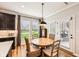 Cozy breakfast nook featuring a round table, wicker chairs, and an outdoor view at 4204 Omaha Dr, Bargersville, IN 46106