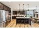 Well-appointed kitchen with a large island, stainless steel appliances, and dark cabinetry at 4204 Omaha Dr, Bargersville, IN 46106