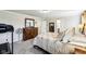 Side view of the large main bedroom showing the bed, dresser, and open doorways at 4204 Omaha Dr, Bargersville, IN 46106